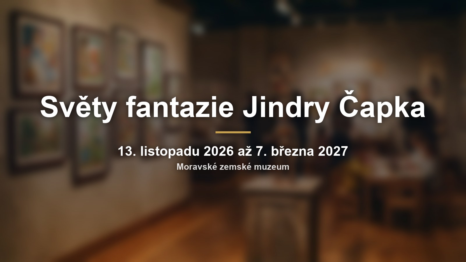 Rozmazaná výstava ilustrací s nápisem Světy fantazie Jindry Čapka